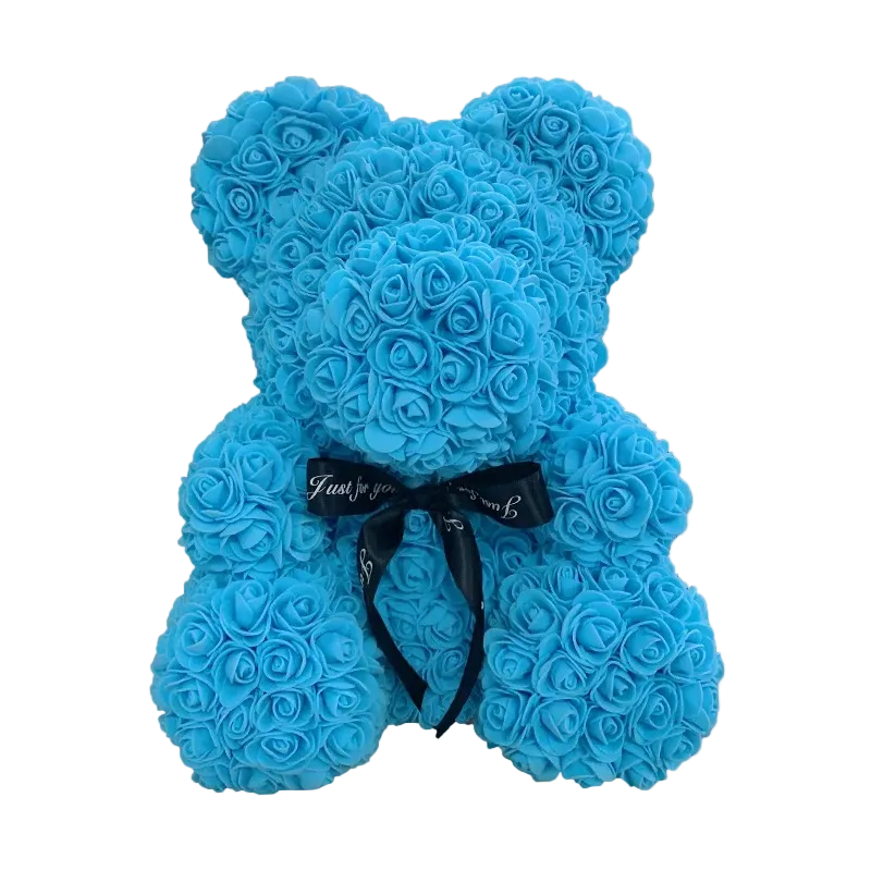 Blue teddy bear made of roses with a black bow on a white background