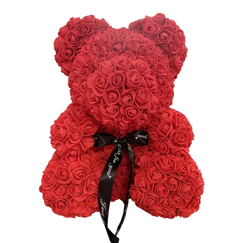 Red rose teddy bear with a black ribbon on a white background