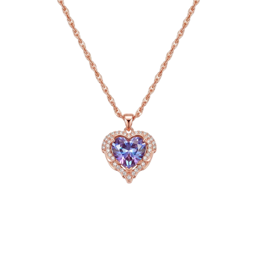 MieleGifts 18K gold plated heart necklace with a mystic-cut cubic zirconia stone and pavé angel wing setting.
