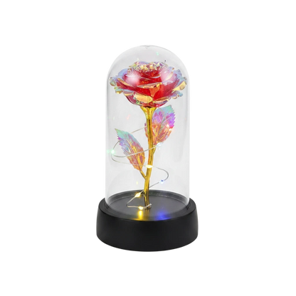 MieleGifts iridescent galaxy rose inside a clear plastic dome with warm LED fairy lights on a black base