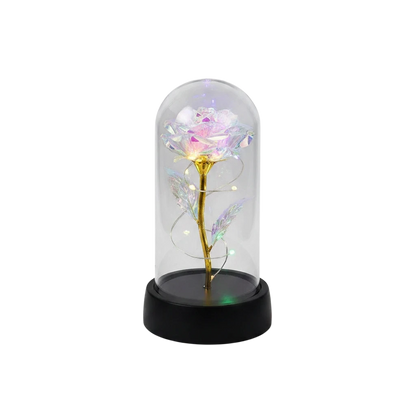 MieleGifts iridescent rose inside a clear plastic dome with glowing LED fairy lights on a black base