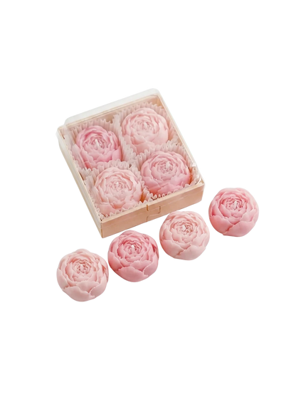 MieleGifts miniature pink rose-shaped soy wax candles in a clear display box on a white background.