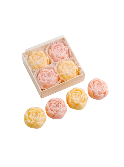 MieleGifts miniature rose-shaped soy wax candles in pink and yellow, presented in a clear gift box.