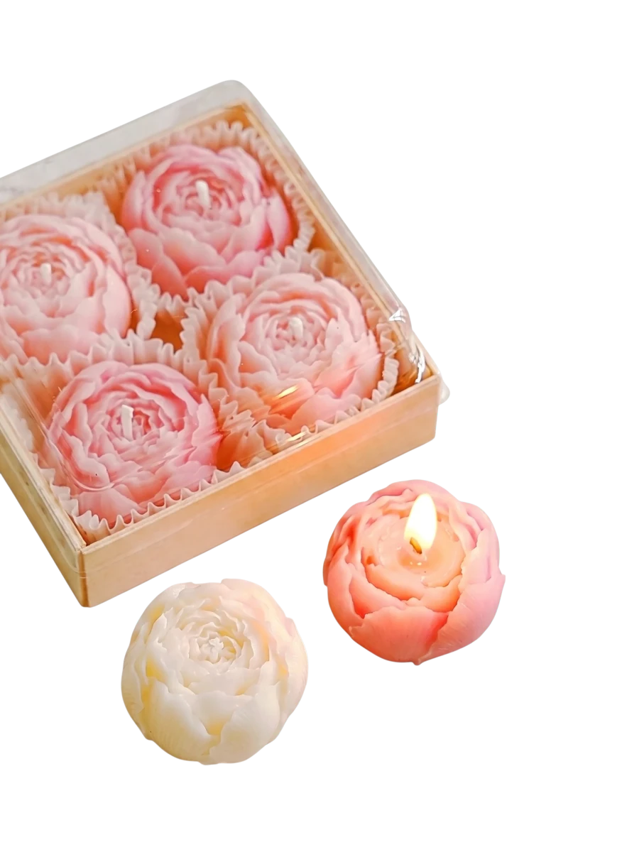 MieleGifts miniature hand-sculpted soy wax rose candles in pink and white, presented in a clear gift box.