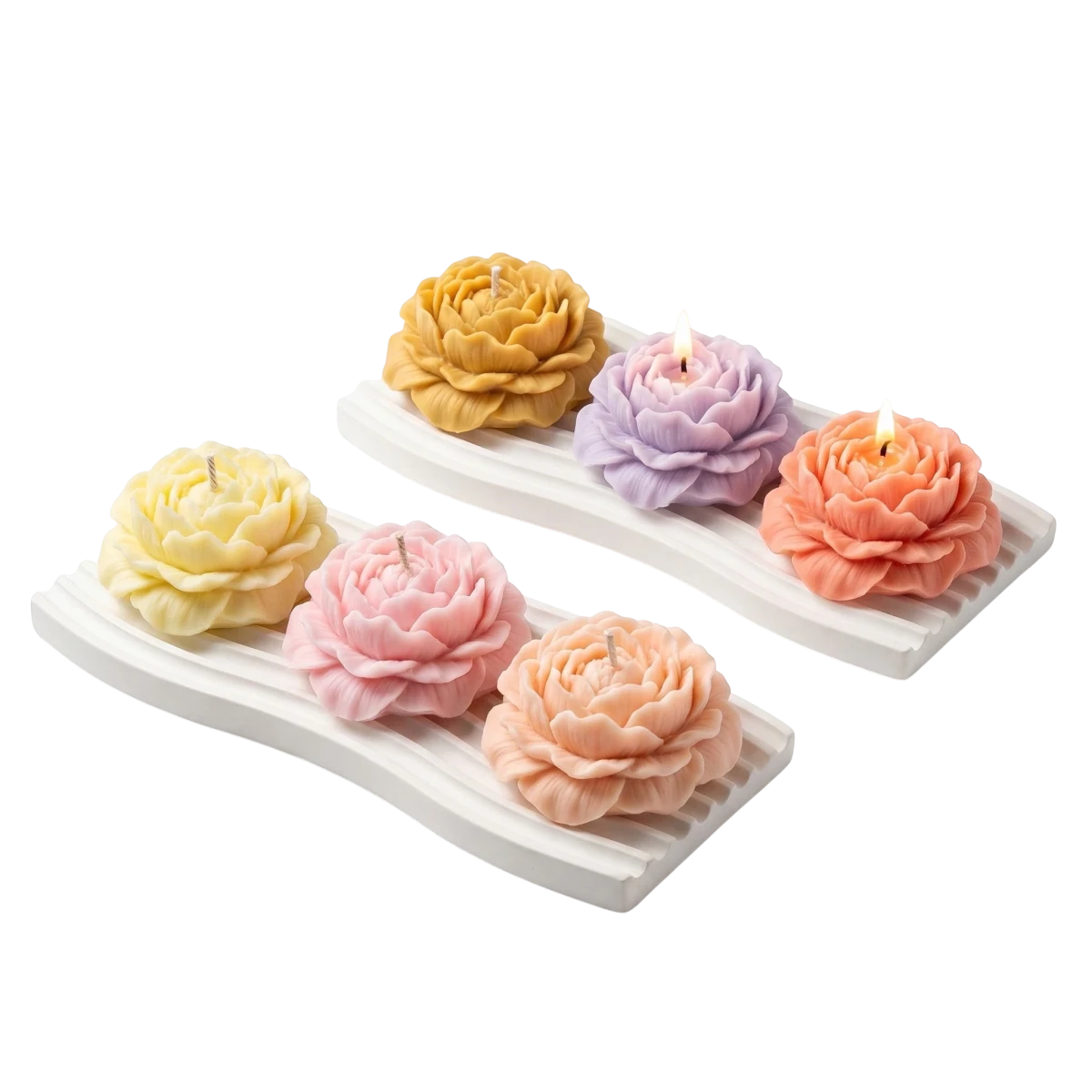 MieleGifts soy wax peony flower candles in pastel colors arranged on white ribbed trays with two candles lit.