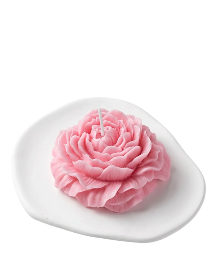 MieleGifts pink peony flower shaped soy wax candle on a white ceramic dish