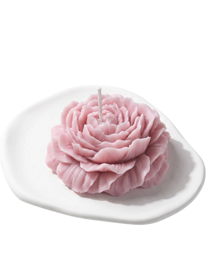 MieleGifts pink peony flower shaped soy wax candle on a white ceramic tray