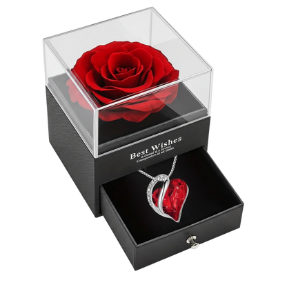 MieleGifts preserved red rose in a black leatherette box with a pull-out drawer containing a crystal heart necklace.