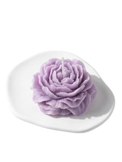 MieleGifts purple peony flower shaped soy wax candle on a small white ceramic tray
