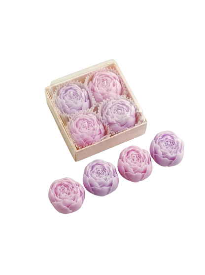 MieleGifts miniature rose-shaped soy wax candles in light purple, presented in a clear display box.