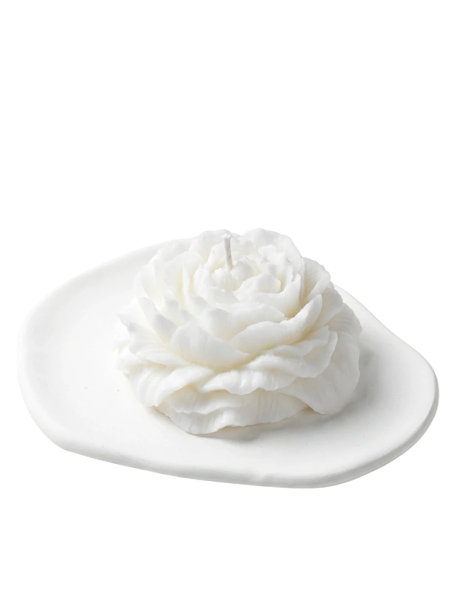 MieleGifts white soy wax candle shaped like a fully bloomed peony flower resting on a matching white ceramic tray