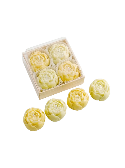 MieleGifts miniature yellow rose-shaped soy wax candles in a clear display box on a white background